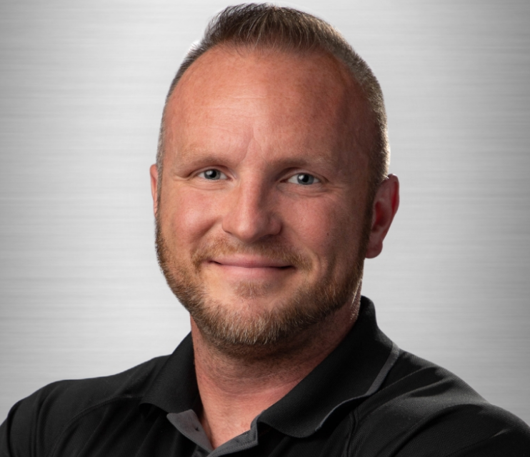 headshot_chris_ganni_president_ceo.webp